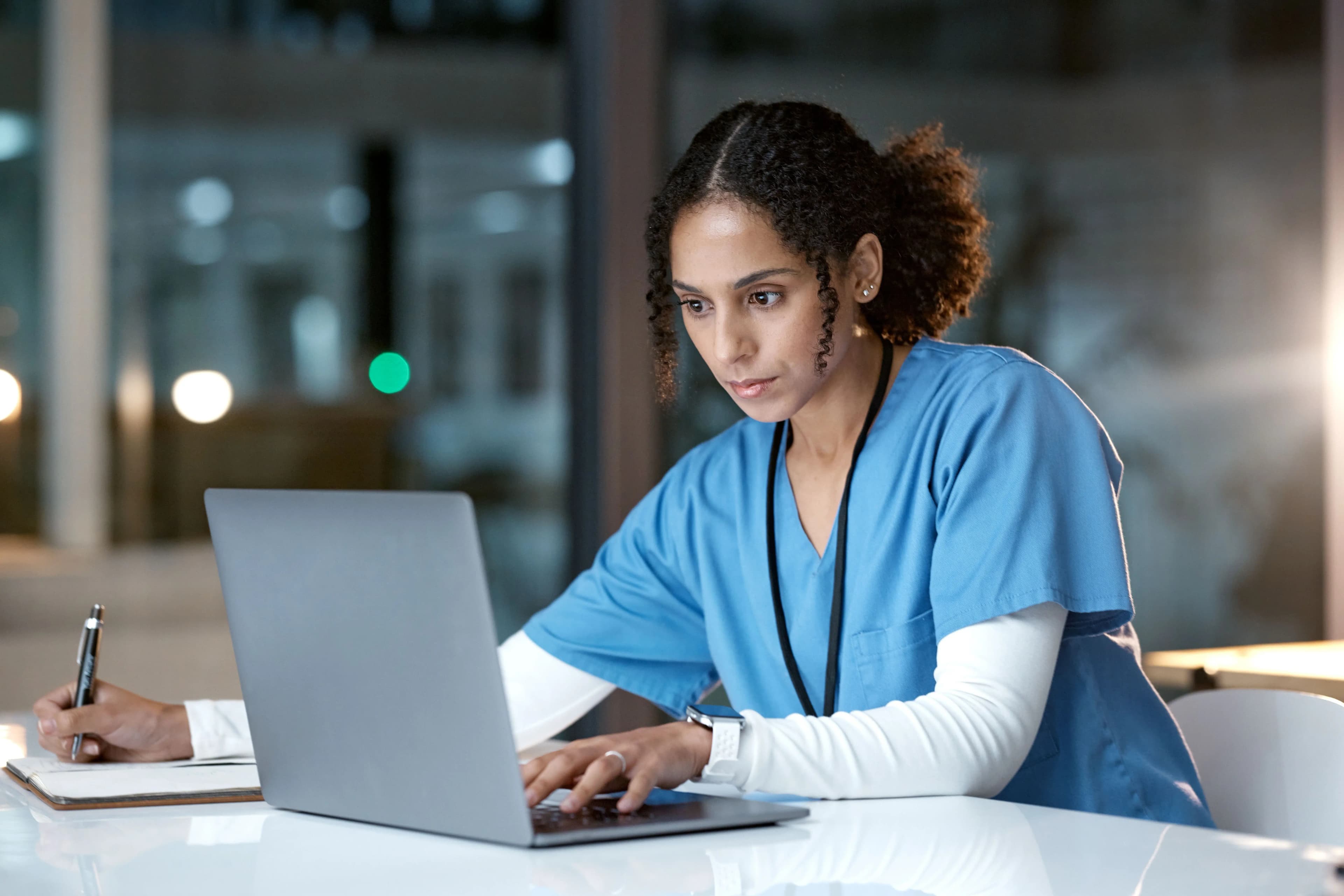 Healthcare professional working with data